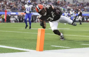 Football Player Diving Touchdown Wallpaper