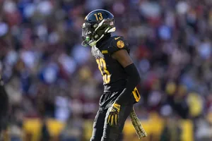 Football Player Emmanuel Forbes Action Shot Wallpaper