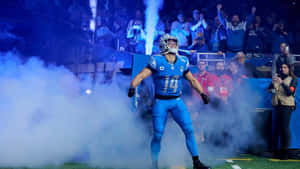 Football_ Player_ Entering_ Stadium_ In_ Smoke Wallpaper