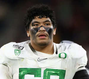 Football Player Eye Blackand Jersey Wallpaper