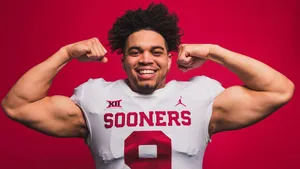 Football Player Flexing Muscles Wallpaper