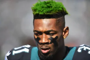Football Player Green Hairand Eye Black Wallpaper