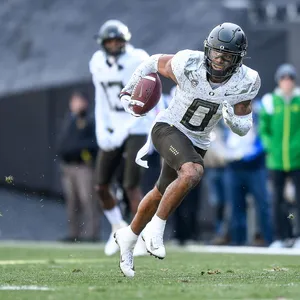 Football Player In Action Wallpaper