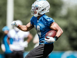 Football Player In Action During Training Wallpaper