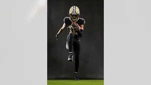 Football Player In Action Portrait Wallpaper