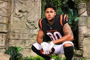 Football_ Player_ In_ Jungle_ Setting.jpg Wallpaper