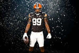 Football_ Player_in_ Rain_99_ Jersey Wallpaper