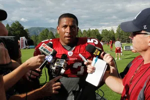 Football Player Interview Outdoors Wallpaper