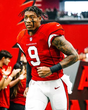 Football Player Isaiah Simmons Cardinals Uniform Wallpaper