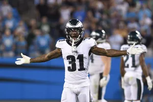 Football Player Jalen Mills Celebration Wallpaper