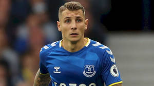 Football Player Lucas Digne Looking Up Wallpaper