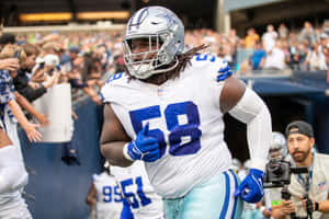 Football_ Player_ Number_58_ Entering_ Stadium Wallpaper