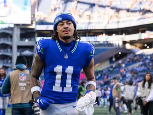 Football Player Number11 Blue Jersey Wallpaper