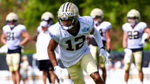 Football Player Number12 Training Session Wallpaper