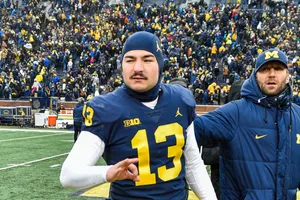 Football Player Number13 Michigan Stadium Wallpaper