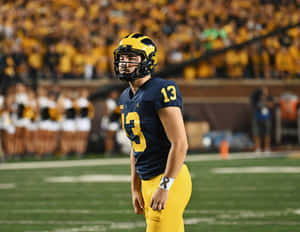 Football Player Number13 On Field Wallpaper