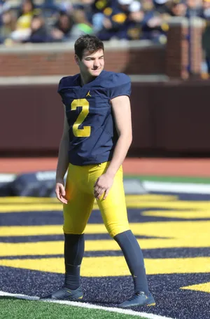 Football Player Number2 Standingon Field Wallpaper