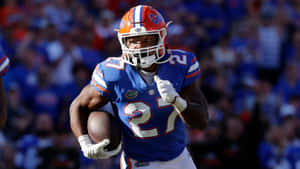 Football Player Number27 Action Shot Wallpaper