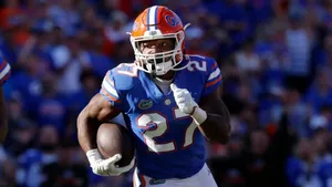 Football Player Number27 Action Shot Wallpaper