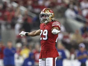 Football Player Number29 Red Uniform Wallpaper