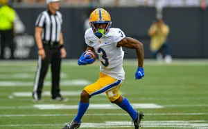 Football Player Number3 Action Shot Wallpaper