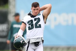 Football Player Number32 Stretching Wallpaper