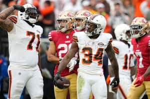 Football Player Number34 Celebration Wallpaper