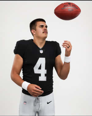 Football Player Number4 Spinning Ball Wallpaper