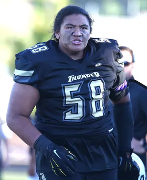 Football Player Number58 Thunder Jersey Wallpaper