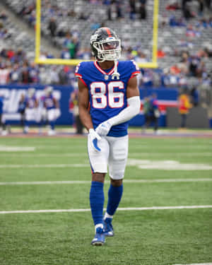 Football Player Number86 On Field.jpg Wallpaper