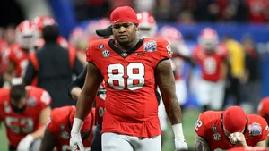 Football Player Number88 Walkingon Field Wallpaper