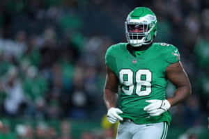 Football Player Number98 Green Uniform Wallpaper