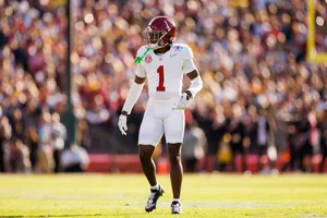 Football Player On Field Wallpaper