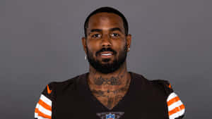 Football Player Portrait Elijah Moore Wallpaper