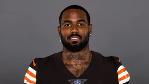 Football Player Portrait Elijah Moore Wallpaper