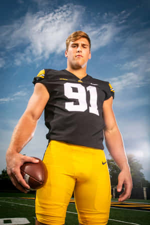 Football Player Pose Number91 Wallpaper