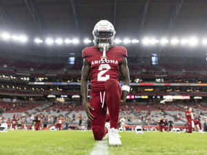Football Player Pre Game Focus Arizona Wallpaper