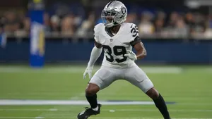 Football Player Ready For Action Wallpaper