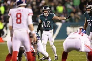 Football Player Ready For Action Wallpaper