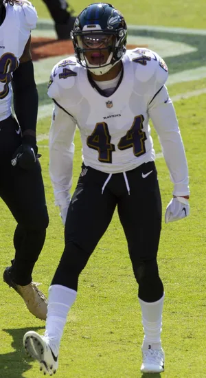 Football Player Ready For Action Wallpaper