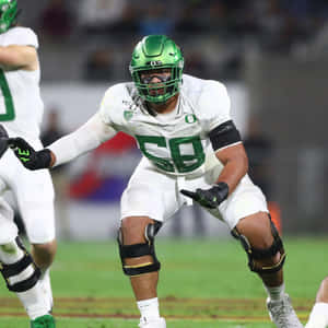 Football Player Ready For Action Wallpaper