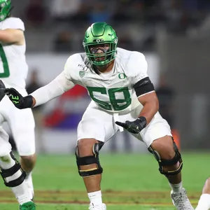 Football Player Ready For Action Wallpaper