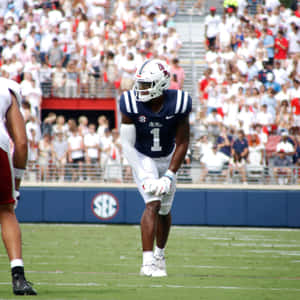 Football Player Ready For Play Wallpaper