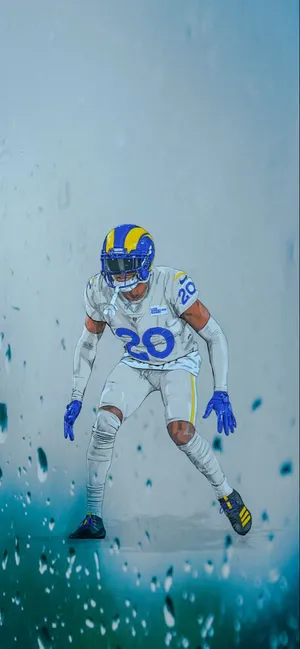 Football_ Player_ Ready_ Position_ Rainy_ Background Wallpaper