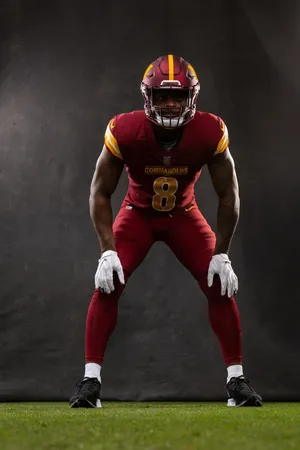 Football Player Ready Position Wallpaper