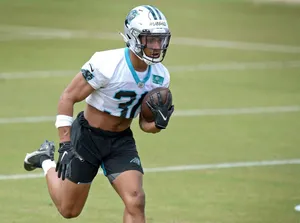 Football Player Running Drill Wallpaper