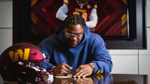 Football Player Signing Contract Wallpaper