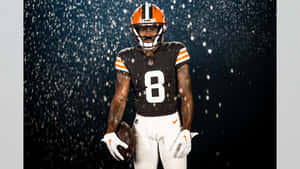 Football Player Snowy Backdrop Wallpaper