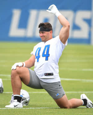 Football Player Stretching During Practice44 Wallpaper