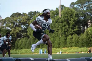 Football Player Training Drill Wallpaper